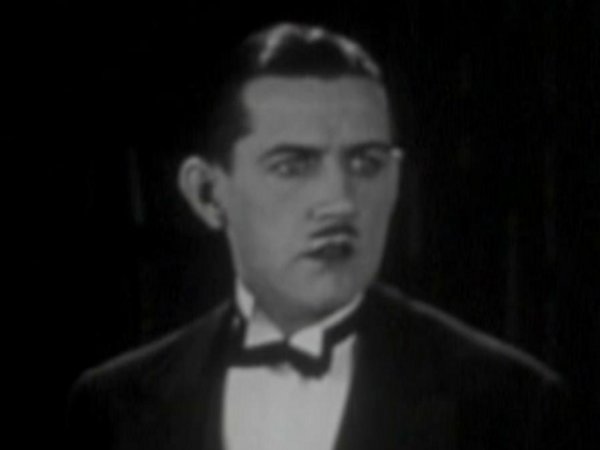 Charley Chase in Dog Shy (1926)