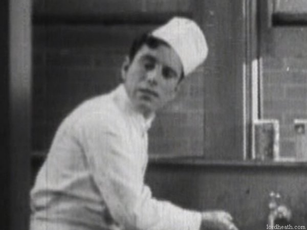 Charlie Hall in Feed 'Em And Weep (1928)