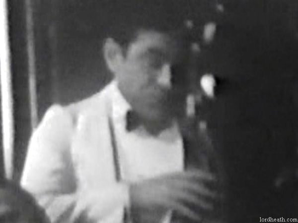 Charlie Hall in Next Week-End (1934)