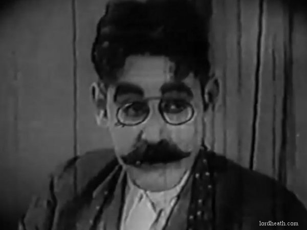 Eddie Baker in The Smile Wins (1923)