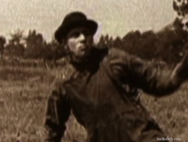 Noah Young in Get Out And Get Under (1920)