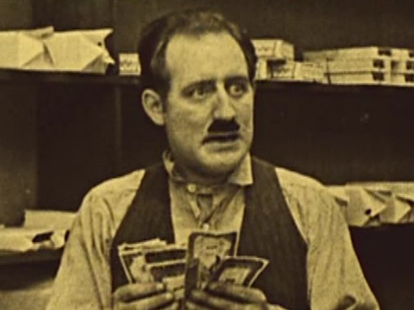 William Gillespie in From Hand To Mouth (1919)