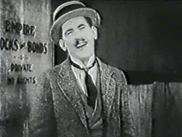 James Parrott in The Smile Wins (1923)
