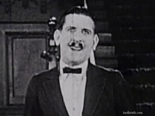 James Parrott in Shiver And Shake (1922)