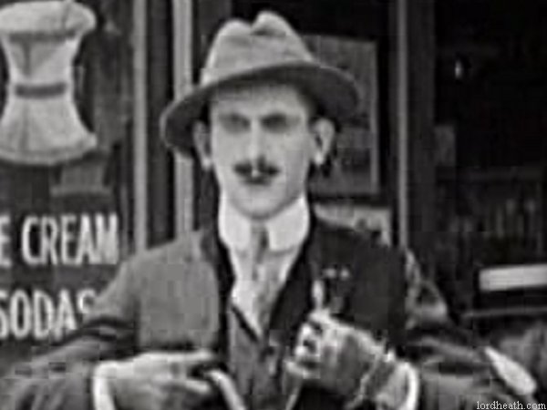 James Parrott in Swing Your Partners (1918)