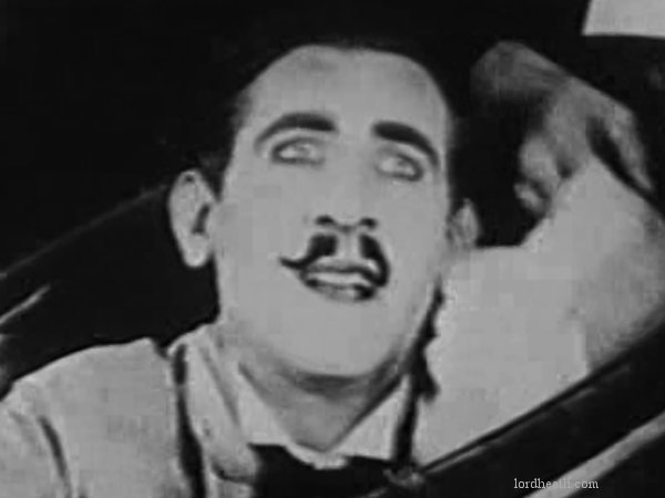 James Parrott in Watch Your Wife (1923)
