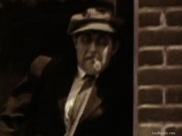 William Gillespie in Get Out And Get Under (1920)